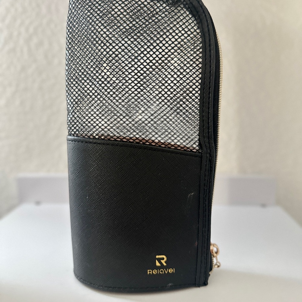 Black Toiletry Bag with Mesh Design and Leather Base